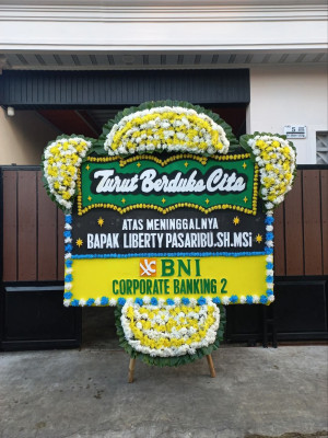 Papan Bunga Duka di Tiom