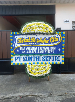 Papan Bunga Duka di Tiom