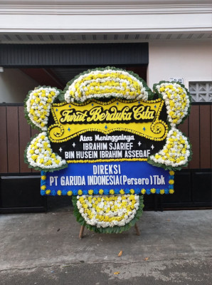 Papan Bunga Duka di Tiom