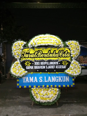 Papan Bunga Duka di Tiom