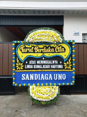 Papan Bunga Duka di Tiom