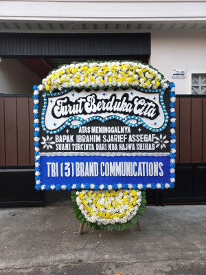 Papan Bunga Duka di Tiom